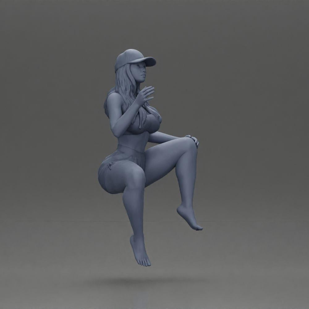 Diorama model building product photo 6: Diorama figure: Sitting female miniature, blue top & shorts, cap, barefoot - relaxed pose (Ref No. A133)