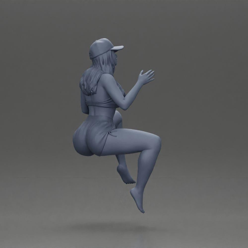 Diorama model building product photo 7: Diorama figure: Sitting female miniature, blue top & shorts, cap, barefoot - relaxed pose (Ref No. A133)