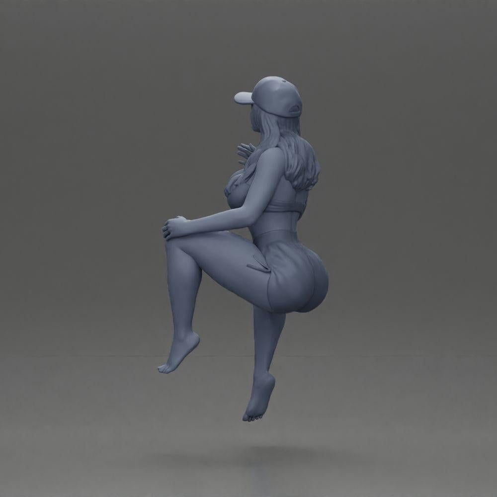 Diorama model building product photo 9: Diorama figure: Sitting female miniature, blue top & shorts, cap, barefoot - relaxed pose (Ref No. A133)