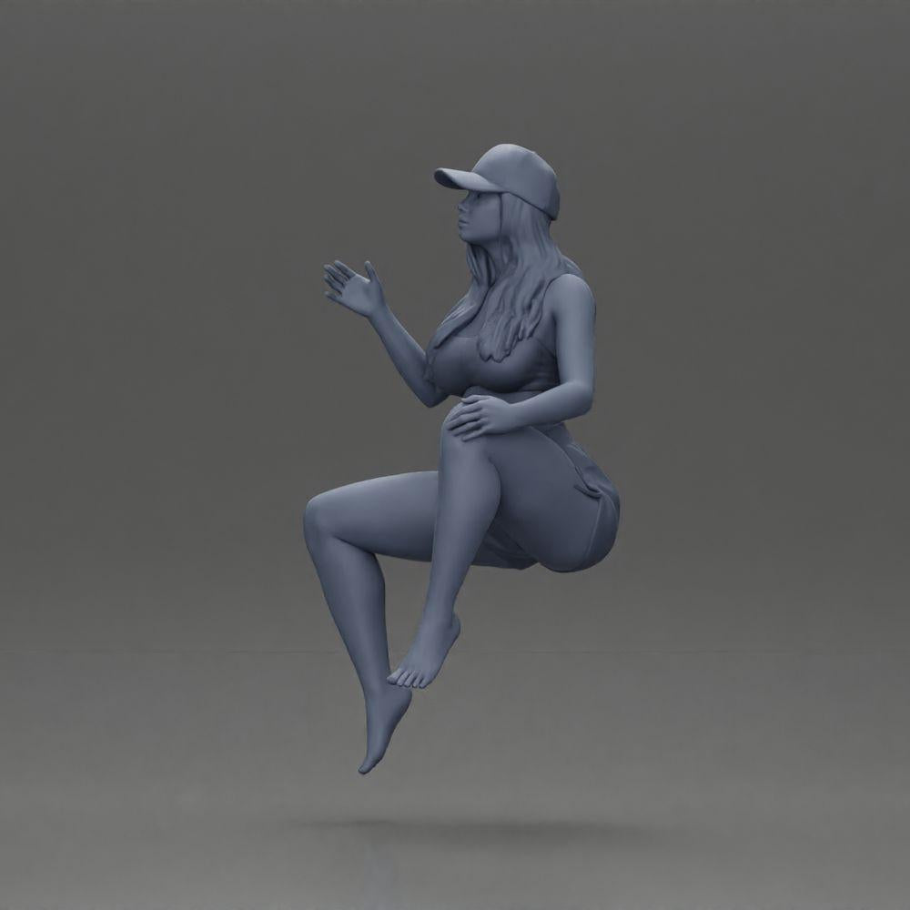 Diorama model building product photo 10: Diorama figure: Sitting female miniature, blue top & shorts, cap, barefoot - relaxed pose (Ref No. A133)