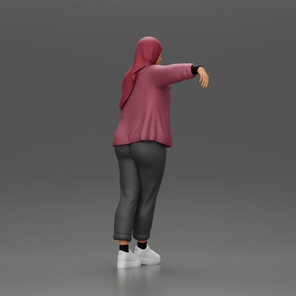 Diorama model building product photo 2: Diorama figure woman with headscarf and jacket, leaning against a car, arm extended (Ref No. A59)
