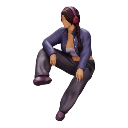 Diorama model building product photo 0: Young girl sitting and listening to music with headphones (Ref No. A42)
