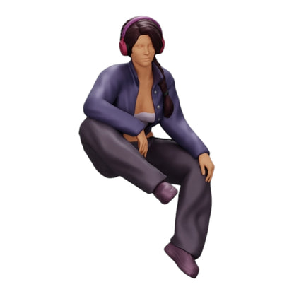 Diorama model building product photo 0: Young girl sitting and listening to music with headphones (Ref No. A42)