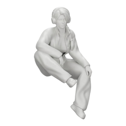 Diorama model building product photo 0: Young girl sitting and listening to music with headphones (Ref No. A42)