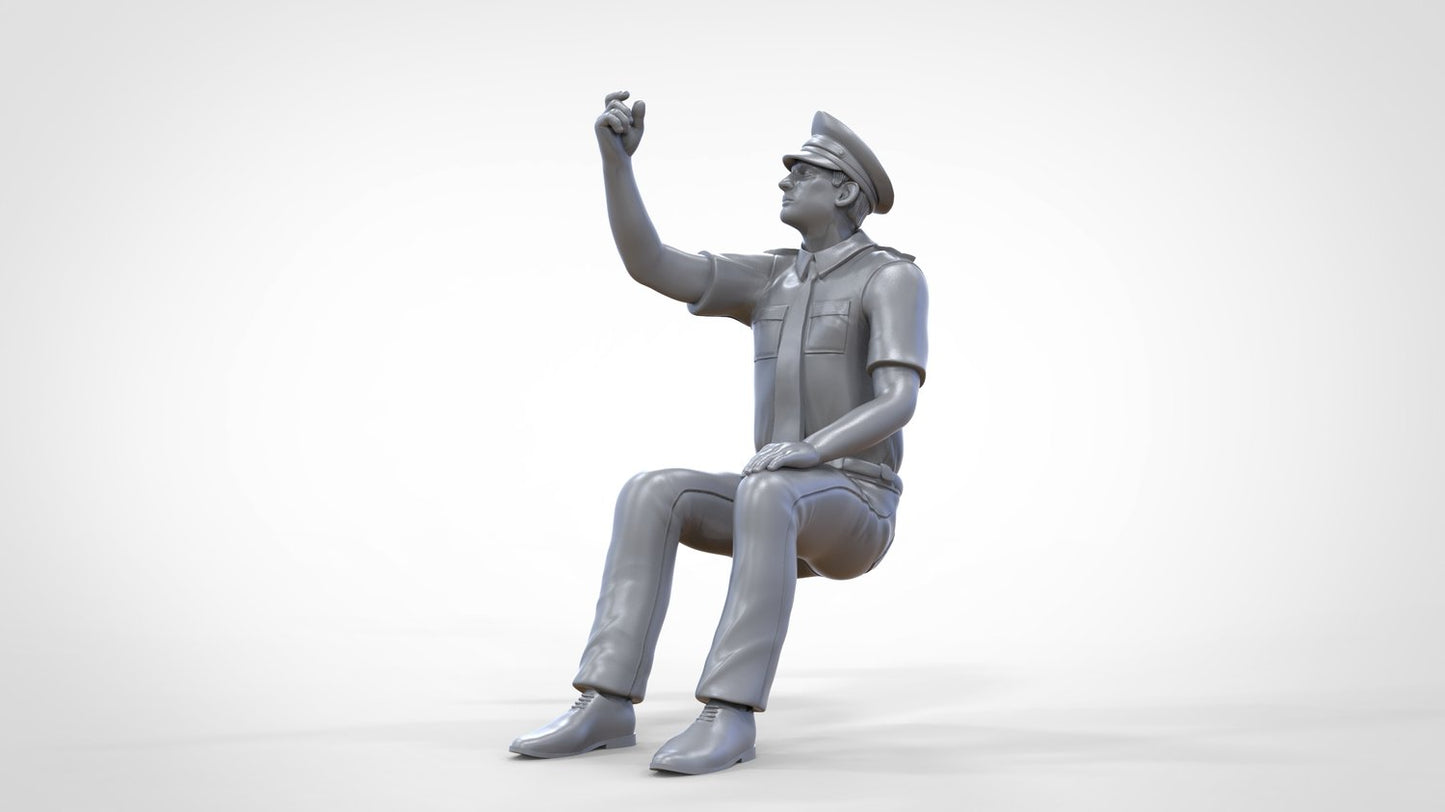 Product photo 0: Pilot in uniform sitting: Aircraft personnel - operating switch
