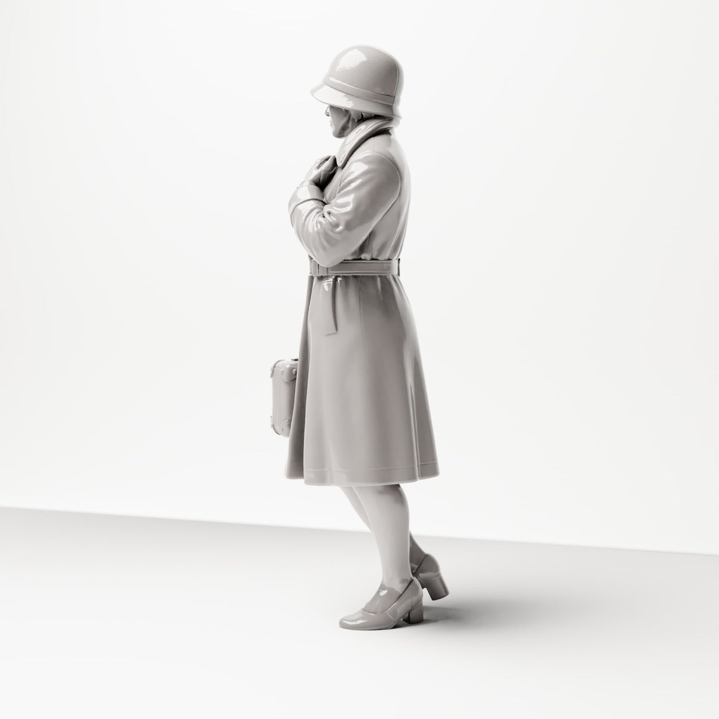Diorama model building product photo 1: Standing figure: Traveling woman at the platform, late 1920s, coat, hat, small suitcase (sc04)
