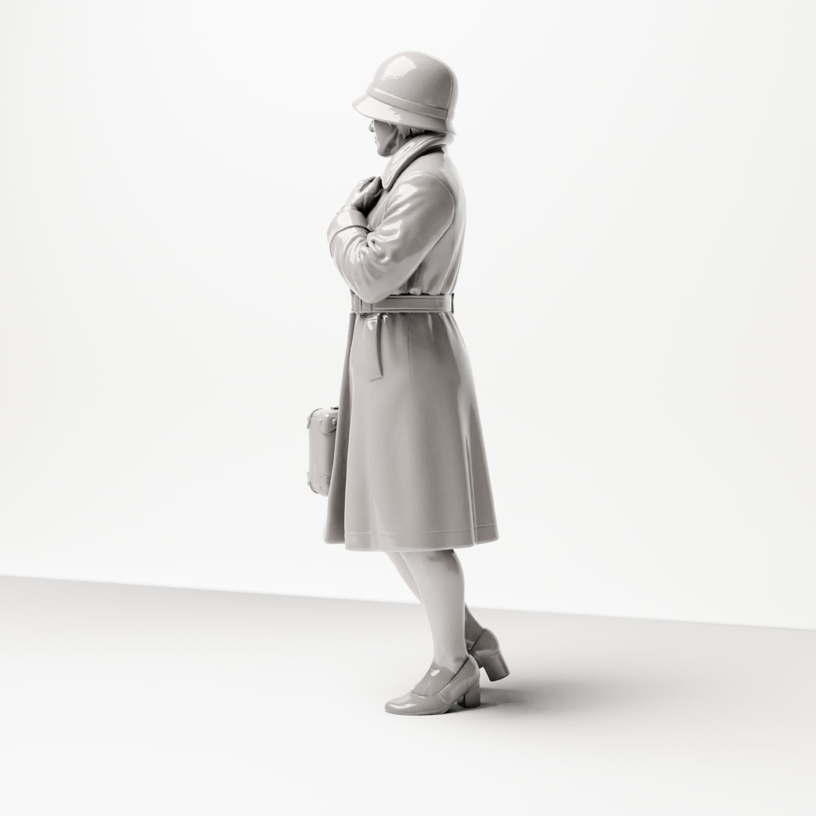 Diorama model building product photo 1: Standing figure: Traveling woman at the platform, late 1920s, coat, hat, small suitcase (sc04)