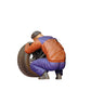 Product photo 0: Mechanic kneeling: Tire change in the auto repair shop