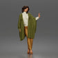 Diorama model-making product photo 0: Standing female figure with raised hand, flowing cape & platform shoes (a174)