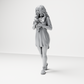 Diorama model-making product photo 6: Standing figure: woman in a nightgown holding a small dog (a183)