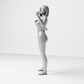Diorama model-making product photo 6: Standing female figure in a one-piece bodysuit with outstretched arms (a206)