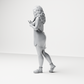 Diorama model making product photo 4: Standing figure: woman in a nightgown holding a small dog (a184)