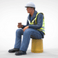 Product photo diorama and model building miniature figure: construction worker sitting on a bucket