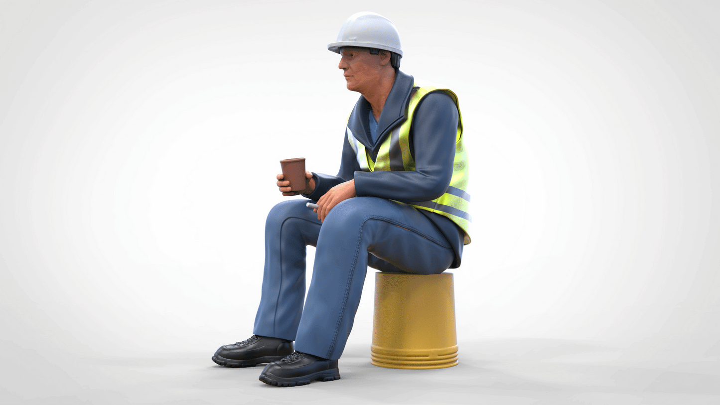 Product photo diorama and model building miniature figure: construction worker sitting on a bucket